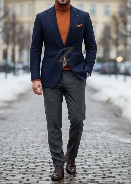 ست کت تک سرمهای با یک یقه اسکی نارنجی سوخته و شلوار پارچهای طوسی